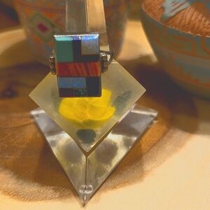 Sterling silver ring with stone and shell inlay.